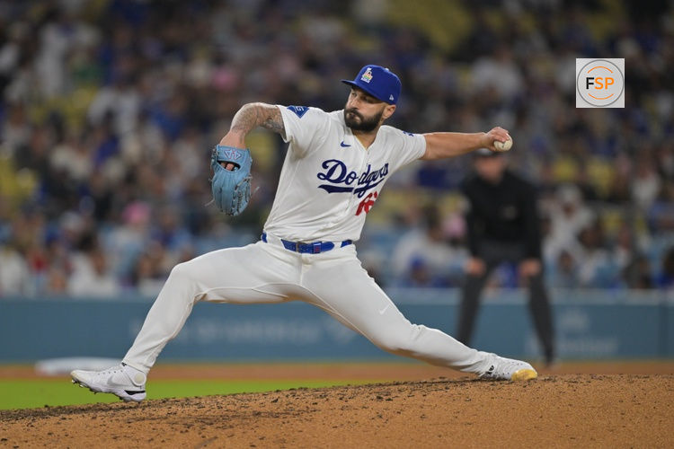 Jun 5, 2026; Los Angeles, California, USA; Los Angeles Dodgers pitcher Tanner Scott (66) pitches during the ninth inning against the Los Angeles Angels at Dodger Stadium. Credit: Jayne Kamin-Oncea-Imagn Images