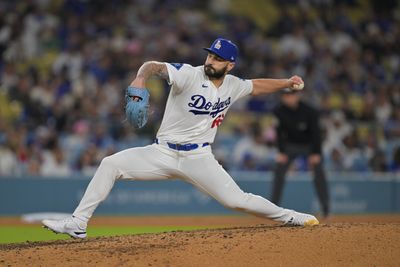 Jun 5, 2026; Los Angeles, California, USA; Los Angeles Dodgers pitcher Tanner Scott (66) pitches during the ninth inning against the Los Angeles Angels at Dodger Stadium. Mandatory Credit: Jayne Kamin-Oncea-Imagn Images