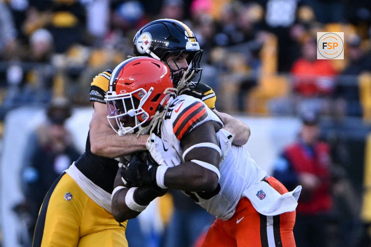 Dec 8, 2024; Pittsburgh, Pennsylvania, USA; Pittsburgh Steelers linebacker Payton Wilson (41) tackles Cleveland Browns tight end David Njoku (85) during the fourth quarter at Acrisure Stadium. Credit: Barry Reeger-Imagn Images