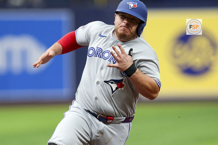 Aug 18, 2026; St. Petersburg, Florida, USA; Toronto Blue Jays catcher Alejandro Kirk (30) rounds third base to score a run against the Tampa Bay Rays in the first inning at Tropicana Field. Credit: Nathan Ray Seebeck-Imagn Images