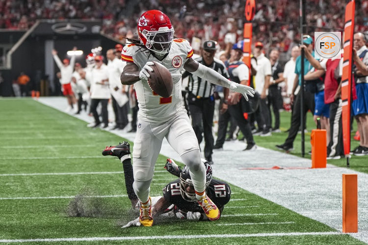 Sep 22, 2024; Atlanta, Georgia, USA; Kansas City Chiefs wide receiver Rashee Rice (4) scores a touchdown past Atlanta Falcons cornerback Dee Alford (20) during the first half at Mercedes-Benz Stadium. Credit: Dale Zanine-Imagn Images