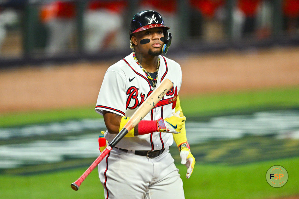 ATLANTA, GA – OCTOBER 07:  Atlanta right fielder Ronald Acuna Jr. (13) flips his bat after drawing a walk during game 1 of the NLDS between the Philadelphia Phillies and the Atlanta Braves on October 7th, 2023 at Truist Park in Atlanta, GA. (Photo by Rich von Biberstein/Icon Sportswire)