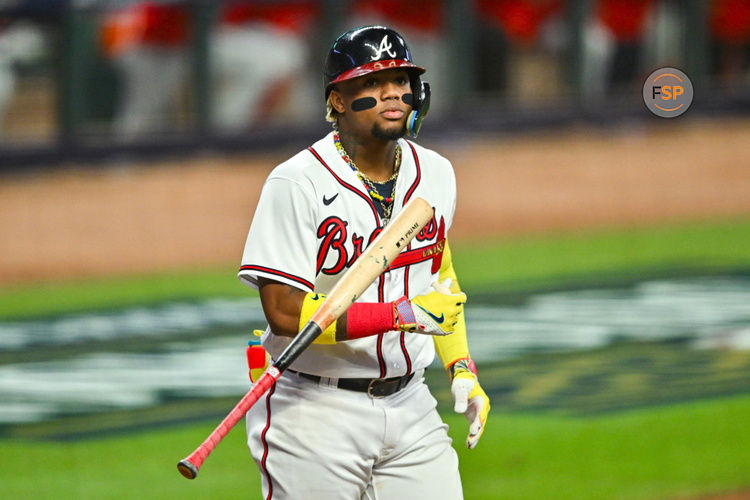 ATLANTA, GA – OCTOBER 07:  Atlanta right fielder Ronald Acuna Jr. (13) flips his bat after drawing a walk during game 1 of the NLDS between the Philadelphia Phillies and the Atlanta Braves on October 7th, 2023 at Truist Park in Atlanta, GA. (Photo by Rich von Biberstein/Icon Sportswire)