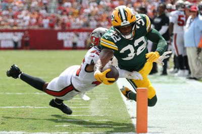 Oct 4, 2026; Tampa, Florida, USA;  Green Bay Packers running back MarShawn Lloyd (32) dives for the touchdown pylon during the first quarter against the Tampa Bay Buccaneers at Raymond James Stadium.  Mandatory Credit: Matt Pendleton-Imagn Images