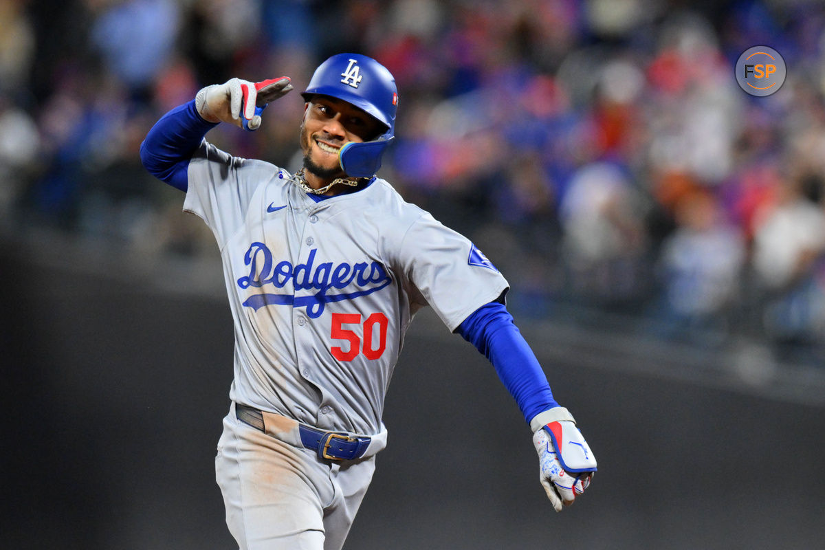 Oct 17, 2024; New York City, New York, USA; Los Angeles Dodgers shortstop Mookie Betts (50) reacts after hitting a two run home run against the New York Mets in the sixth inning during game four of the NLCS for the 2024 MLB playoffs at Citi Field. Credit: John Jones-Imagn Images