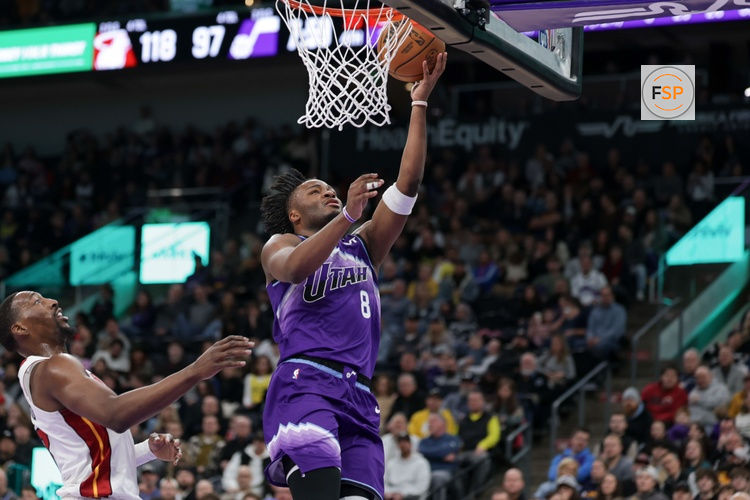 Jan 24, 2026; Salt Lake City, Utah, USA;  Utah Jazz guard Isaiah Collier (8) gets the basket and scores during the second half against the Miami Heat at Delta Center. Credit: Chris Nicoll-Imagn Images