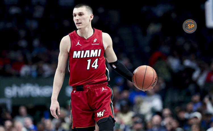 Feb 13, 2025; Dallas, Texas, USA;  Miami Heat guard Tyler Herro (14) controls the ball during the second half against the Dallas Mavericks at American Airlines Center. Credit: Kevin Jairaj-Imagn Images