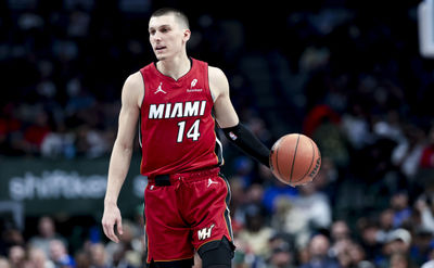 Feb 13, 2025; Dallas, Texas, USA;  Miami Heat guard Tyler Herro (14) controls the ball during the second half against the Dallas Mavericks at American Airlines Center. Mandatory Credit: Kevin Jairaj-Imagn Images