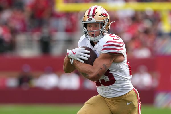 Sep 28, 2025; Santa Clara, California, USA; San Francisco 49ers running back Christian McCaffrey (23) carries the ball against the Jacksonville Jaguars during the second quarter at Levi's Stadium. Mandatory Credit: Darren Yamashita-Imagn Images