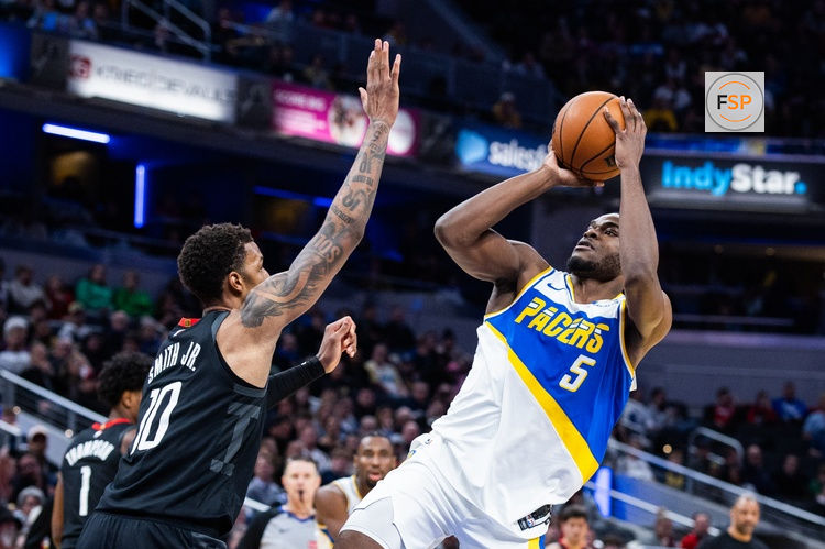 Feb 2, 2026; Indianapolis, Indiana, USA;  Indiana Pacers forward Jarace Walker (5) shoots the ball while Houston Rockets forward Jabari Smith Jr. (10) defends in the second half at Gainbridge Fieldhouse. Credit: Trevor Ruszkowski-Imagn Images