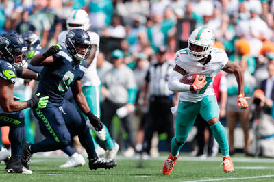 Sep 22, 2024; Seattle, Washington, USA; Miami Dolphins wide receiver Jaylen Waddle (17) runs with the ball during the second quarter against Seattle Seahawks at Lumen Field. Mandatory Credit: Kevin Ng-Imagn Images