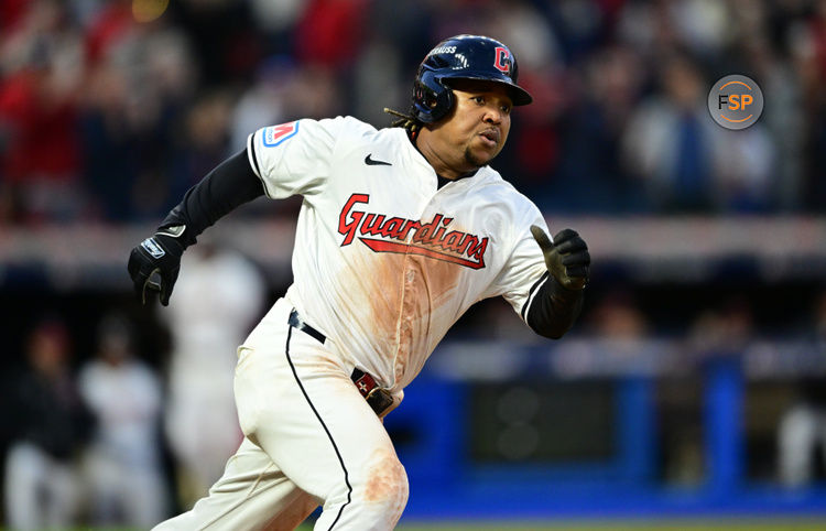 Oct 17, 2024; Cleveland, Ohio, USA; Cleveland Guardians third baseman Jose Ramirez (11) hits a double during the fifth inning against the New York Yankees in game 3 of the American League Championship Series at Progressive Field. Credit: David Dermer-Imagn Images