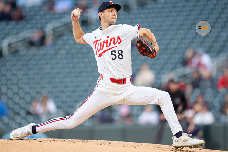 Apr 23, 2025; Minneapolis, Minnesota, USA; Minnesota Twins starting pitcher David Festa (58) throws to Chicago White Sox center fielder Luis Robert Jr. (88) in the first inning at Target Field. Credit: Matt Blewett-Imagn Images