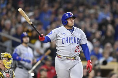Apr 27, 2026; San Diego, California, USA; Chicago Cubs catcher Moises Ballesteros (25) hits a grand slam during the third inning against the San Diego Padres at Petco Park. Mandatory Credit: Denis Poroy-Imagn Images
