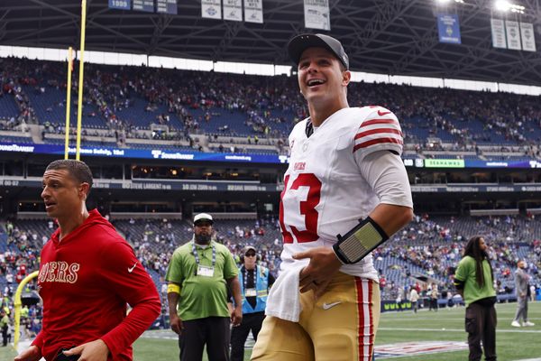 Sep 7, 2025; Seattle, Washington, USA; San Francisco 49ers quarterback Brock Purdy (13) reacts after the game against the Seattle Seahawks during the fourth quarter at Lumen Field. Mandatory Credit: Joe Nicholson-Imagn Images