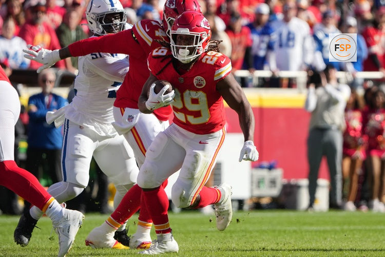 Nov 23, 2025; Kansas City, Missouri, USA;  Kansas City Chiefs running back Kareem Hunt (29) runs against the Indianapolis Colts in the first quarter at GEHA Field at Arrowhead Stadium. Credit: Denny Medley-Imagn Images