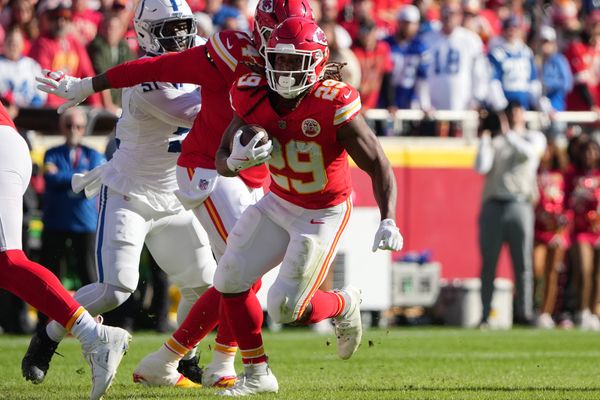 Nov 23, 2025; Kansas City, Missouri, USA;  Kansas City Chiefs running back Kareem Hunt (29) runs against the Indianapolis Colts in the first quarter at GEHA Field at Arrowhead Stadium. Mandatory Credit: Denny Medley-Imagn Images