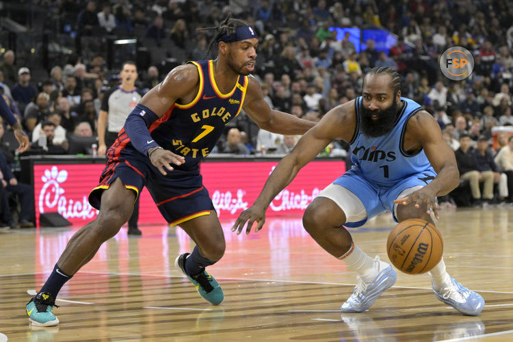 Dec 27, 2024; Inglewood, California, USA; Los Angeles Clippers guard James Harden (1) is defended by Golden State Warriors guard Buddy Hield (7) in the first half at Intuit Dome. Credit: Jayne Kamin-Oncea-Imagn Images