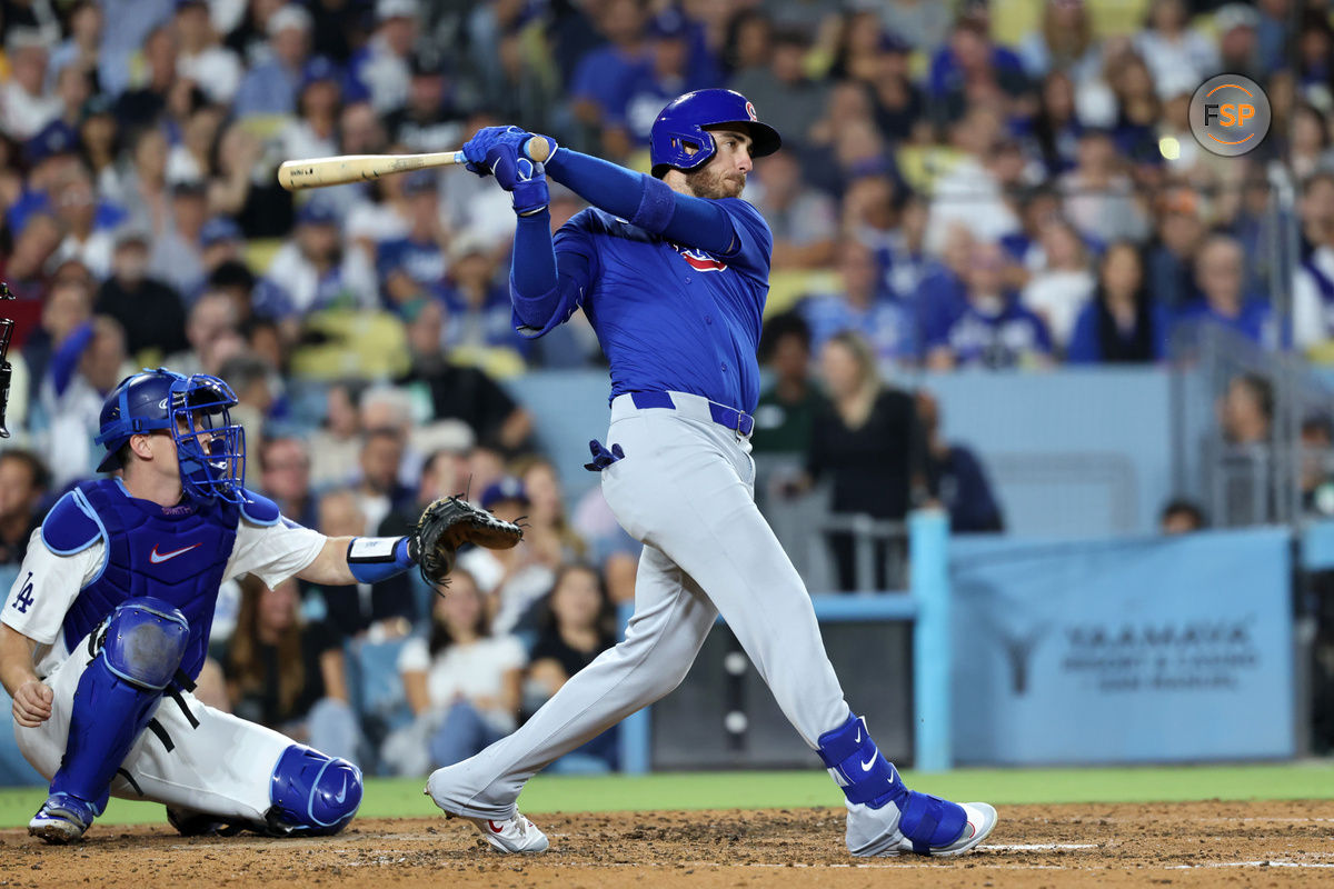 Sep 11, 2024; Los Angeles, California, USA;  Chicago Cubs right fielder Cody Bellinger (24) hits a 3-run home run during the fifth inning against the Los Angeles Dodgers at Dodger Stadium. Credit: Kiyoshi Mio-Imagn Images