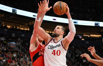 Feb 2, 2025; Toronto, Ontario, CAN; Los Angeles Clippers center Ivica Zubac (40) shoots the ball against the Toronto Raptors in the second half at Scotiabank Arena. Mandatory Credit: Dan Hamilton-Imagn Images