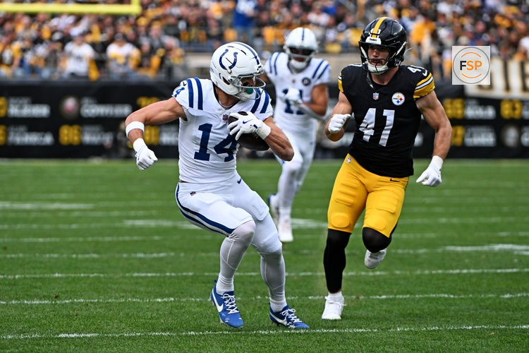 Nov 2, 2025; Pittsburgh, Pennsylvania, USA; Indianapolis Colts wide receiver Alec Pierce (14) catches a pass during the first half as Pittsburgh Steelers linebacker Payton Wilson (41) defends at Acrisure Stadium. Credit: Barry Reeger-Imagn Images