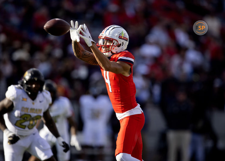 Oct 19, 2024; Tucson, Arizona, USA; Arizona Wildcats wide receiver Tetairoa McMillan (4) against the Colorado Buffalos at Arizona Stadium. Credit: Mark J. Rebilas-Imagn Images