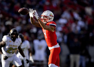 Oct 19, 2024; Tucson, Arizona, USA; Arizona Wildcats wide receiver Tetairoa McMillan (4) against the Colorado Buffalos at Arizona Stadium. Mandatory Credit: Mark J. Rebilas-Imagn Images