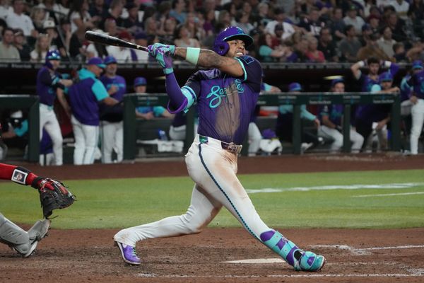 Sep 5, 2025; Phoenix, Arizona, USA; Arizona Diamondbacks second base Ketel Marte (4) hits against the Boston Red Sox in the eighth inning at Chase Field. Mandatory Credit: Rick Scuteri-Imagn Images
