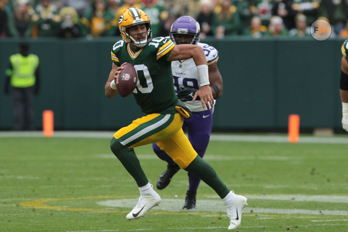 GREEN BAY, WI - OCTOBER 29: Green Bay Packers quarterback Jordan Love (10) is chased out of the pocket during a game between the Green Bay Packers and the Minnesota Vikings on October 29, 2023 at Lambeau Field, in Green Bay, WI. (Photo by Larry Radloff/Icon Sportswire)