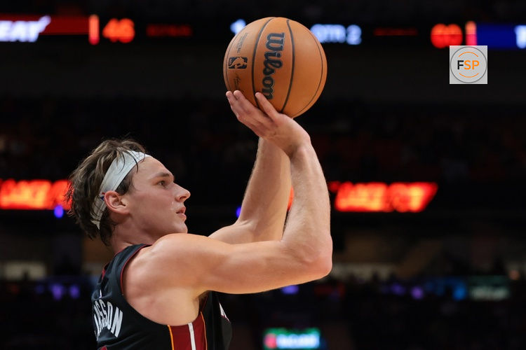 Oct 23, 2026; Miami, Florida, USA; Miami Heat guard Pelle Larsson (9) shoots the basketball against the Detroit Pistons during the second quarter at Kaseya Center. Credit: Sam Navarro-Imagn Images