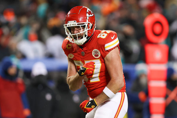 KANSAS CITY, MO - JANUARY 13: Kansas City Chiefs tight end Travis Kelce (87) rects after dropping a pass in the first quarter of an AFC Wild Card playoff game between the Miami Dolphins and Kansas City Chiefs on Jan 13, 2024 at GEHA Field at Arrowhead Stadium in Kansas City, MO. (Photo by Scott Winters/Icon Sportswire)