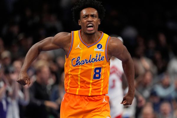 Nov 29, 2025; Charlotte, North Carolina, USA; Charlotte Hornets guard Collin Sexton (8) reacts after defeating the Toronto Raptors in overtime at Spectrum Center. Mandatory Credit: Jim Dedmon-Imagn Images