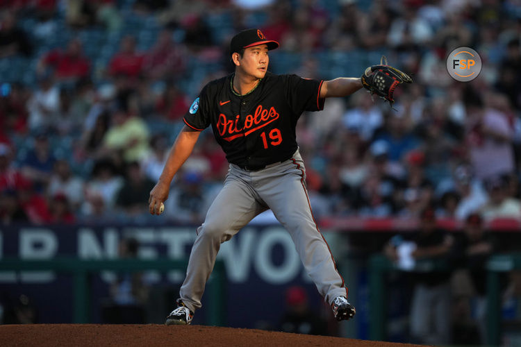 May 9, 2025; Anaheim, California, USA; Baltimore Orioles starting pitcher Tomoyuki Sugano (19) throws in the first inning against the Los Angeles Angels at Angel Stadium. Credit: Kirby Lee-Imagn Images