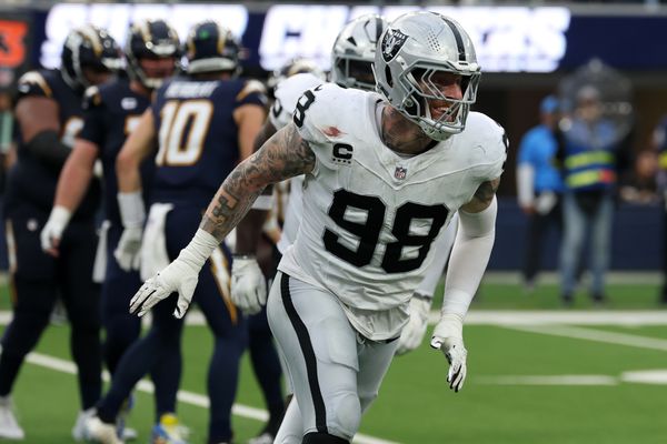 Nov 30, 2025; Inglewood, California, USA; Las Vegas Raiders defensive end Maxx Crosby (98) reacts after a tackle against the Los Angeles Chargers during the second half at SoFi Stadium. Mandatory Credit: Kiyoshi Mio-Imagn Images