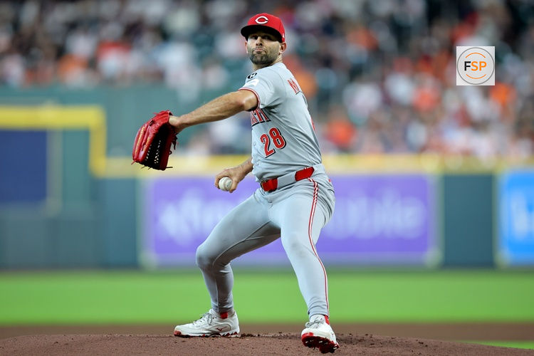 May 9, 2025; Houston, Texas, USA; Cincinnati Reds pitcher Nick Martinez (28) delivers a pitch against the Houston Astros during the first inning at Daikin Park. Credit: Erik Williams-Imagn Images