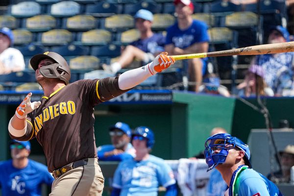 Jul 19, 2026; Kansas City, Missouri, USA; San Diego Padres first baseman Ty France (25) hits a grand slam against the Kansas City Royals during the eighth inning at Kauffman Stadium. Mandatory Credit: Denny Medley-Imagn Images