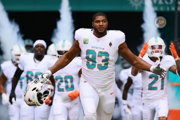 Oct 27, 2024; Miami Gardens, Florida, USA; Miami Dolphins defensive tackle Calais Campbell (93) enters the field before the game against the Arizona Cardinals at Hard Rock Stadium. Credit: Sam Navarro-Imagn Images