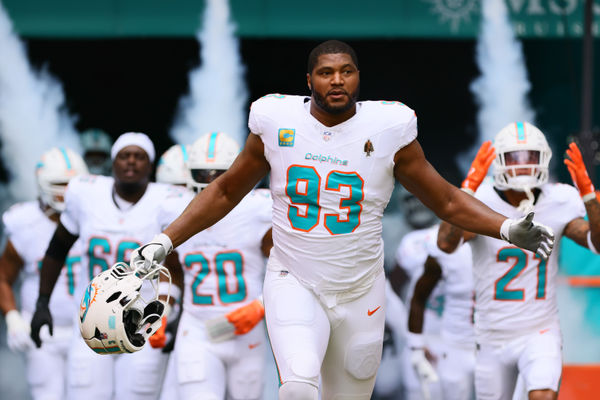 Oct 27, 2024; Miami Gardens, Florida, USA; Miami Dolphins defensive tackle Calais Campbell (93) enters the field before the game against the Arizona Cardinals at Hard Rock Stadium. Mandatory Credit: Sam Navarro-Imagn Images