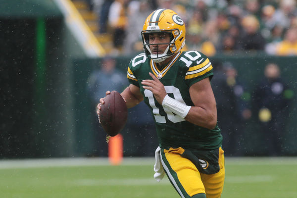 GREEN BAY, WI - NOVEMBER 05: Green Bay Packers quarterback Jordan Love (10) scrambles during a game between the Green Bay Packers and the Los Angeles Rams at Lambeau Field on November 5, 2023 in Green Bay, WI. (Photo by Larry Radloff/Icon Sportswire)