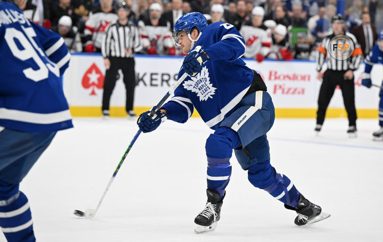 Jan 16, 2025; Toronto, Ontario, CAN;  Toronto Maple Leafs forward William Nylander (88) shoots the puck against the New Jersey Devils in the third period at Scotiabank Arena. Credit: Dan Hamilton-Imagn Images