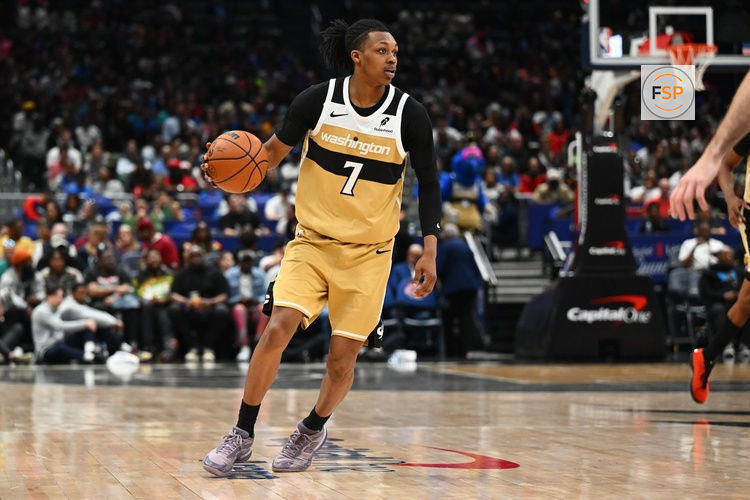 Mar 21, 2026; Washington, District of Columbia, USA; Washington Wizards guard Bub Carrington (7) advances the ball against the Oklahoma City Thunder during the first half at Capital One Arena. Credit: Brad Mills-Imagn Images