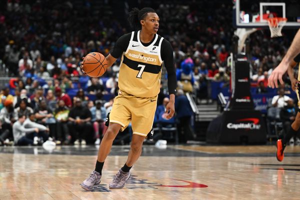 Mar 21, 2026; Washington, District of Columbia, USA; Washington Wizards guard Bub Carrington (7) advances the ball against the Oklahoma City Thunder during the first half at Capital One Arena. Mandatory Credit: Brad Mills-Imagn Images
