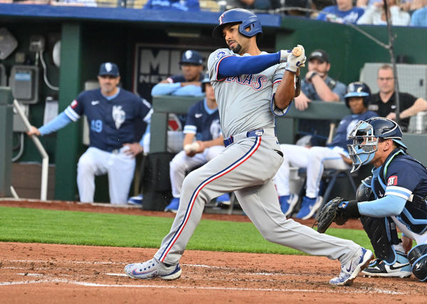 KANSAS CITY, MO - MAY 03: Texas Rangers second baseman Marcus Semien (2) doubles in the third inning during a MLB game on May 03, 2024, between the Texas Rangers and the Kansas City Royals at Kauffman Stadium, Kansas City, MO.  (Photo by Keith Gillett/Icon Sportswire)