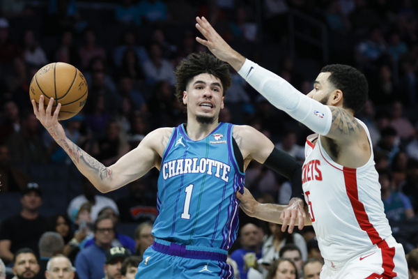 Jan 26, 2024; Charlotte, North Carolina, USA; Charlotte Hornets guard LaMelo Ball (1) moves against Houston Rockets guard Fred VanVleet (5) during the first quarter at Spectrum Center. Mandatory Credit: Nell Redmond-USA TODAY Sports