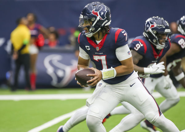 HOUSTON, TX - DECEMBER 03:  Houston Texans quarterback C.J. Stroud (7) prepares to hand off the ball in the second quarter during the football game between Denver Broncos and Houston Texans at NRG Stadium on December 3, 2023 in Houston, Texas.  (Photo by Leslie Plaza Johnson/Icon Sportswire)