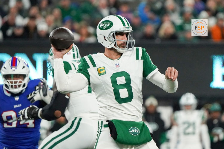 Oct 14, 2024; East Rutherford, New Jersey, USA; New York Jets quarterback Aaron Rodgers (8) throws a pass during the first half against the Buffalo Bills at MetLife Stadium. Credit: Lucas Boland-Imagn Images