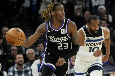 Feb 3, 2025; Minneapolis, Minnesota, USA; Sacramento Kings guard Keon Ellis (23) brings the ball up court after stealing it from the Minnesota Timberwolves in the third quarter at Target Center. Mandatory Credit: Bruce Kluckhohn-Imagn Images