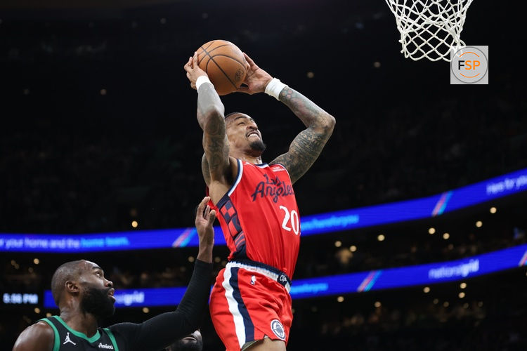 Nov 16, 2025; Boston, Massachusetts, USA; Los Angeles Clippers center John Collins (20) shoots during the second half against the Boston Celtics at TD Garden. Credit: Paul Rutherford-Imagn Images