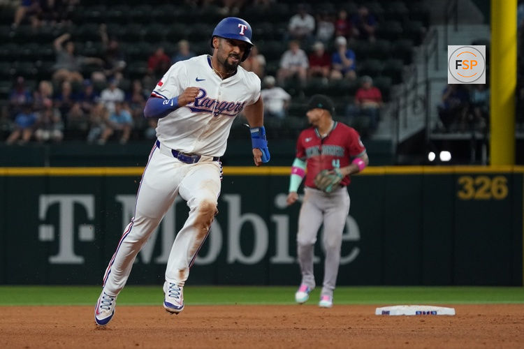 Aug 13, 2025; Arlington, Texas, USA; Texas Rangers second baseman Marcus Semien (2) advance to third base during the fifth inning against the Arizona Diamondbacks at Globe Life Field. Credit: Raymond Carlin III-Imagn Images