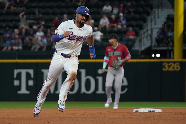 Aug 13, 2025; Arlington, Texas, USA; Texas Rangers second baseman Marcus Semien (2) advance to third base during the fifth inning against the Arizona Diamondbacks at Globe Life Field. Mandatory Credit: Raymond Carlin III-Imagn Images